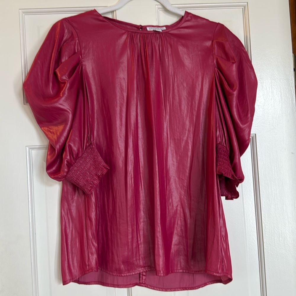 Flowy material but appears as leather look